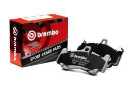 Why do car brake pads make a whistling noise?
